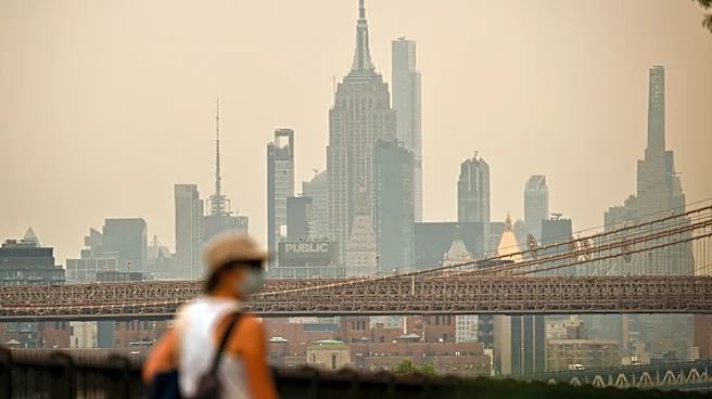 Canadian wildfire smoke envelops Northeast in yellow haze. See photos