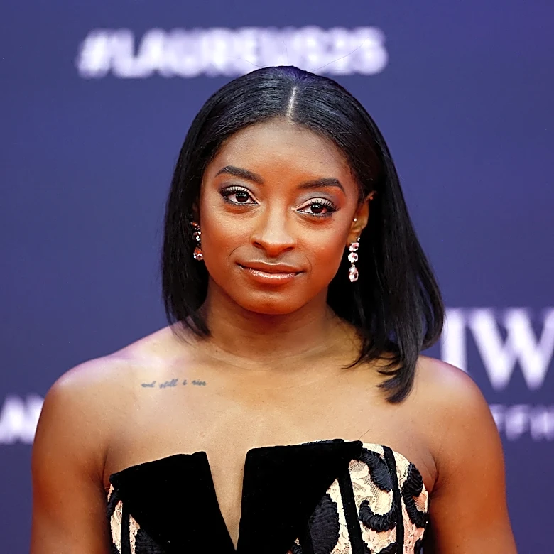 Simone Biles says singer took her YSL shades at Taylor Swift's wedding