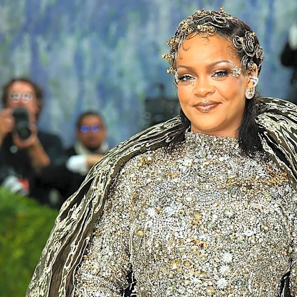 Rihanna returns to Carnival in colorful feathered costume