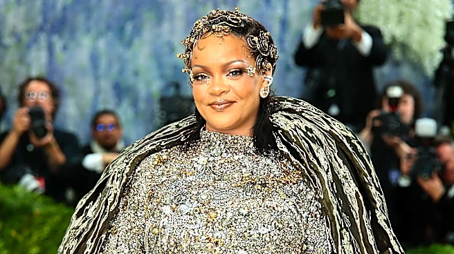 Rihanna returns to Carnival in colorful feathered costume