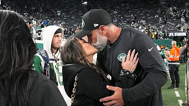 Falcons' defensive coordinator back at camp following wife's death