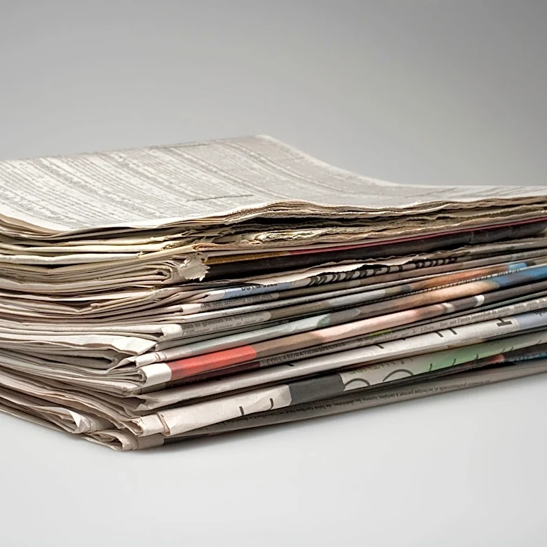 Former reporter settles lawsuit over Kansas newspaper raid for $850K