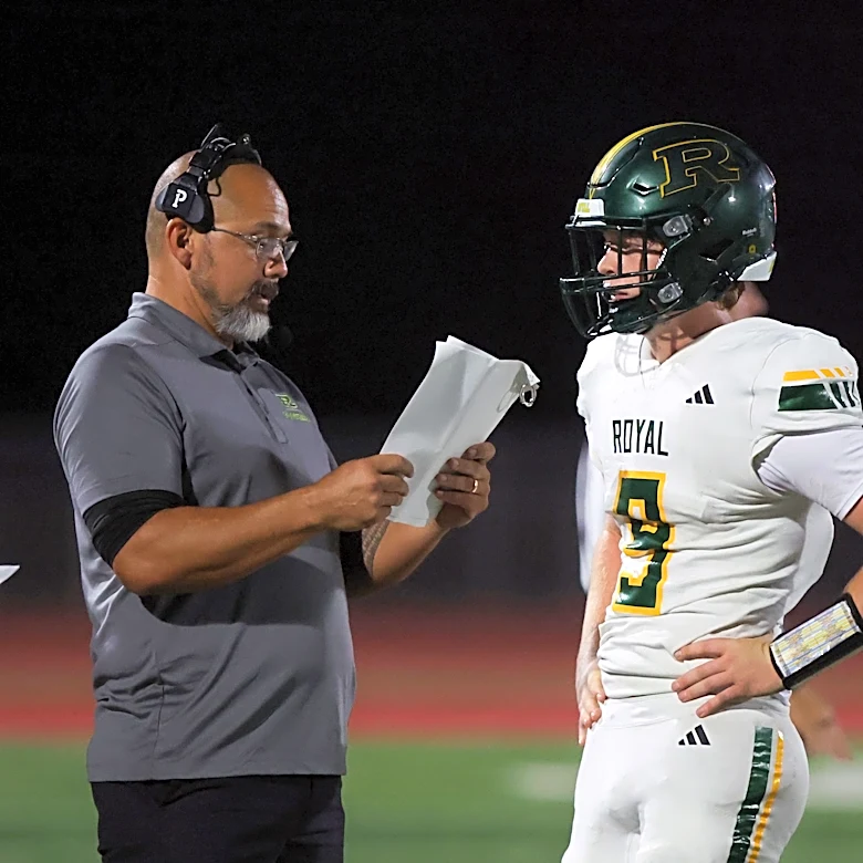 California high school football coach fired after kicking football at player