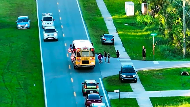 When can you legally pass and stopped school bus?