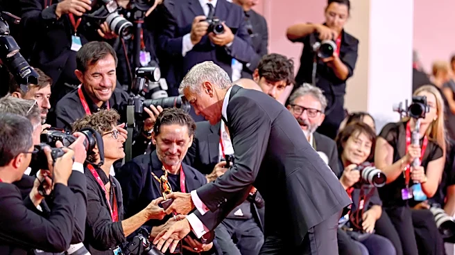 George Clooney created special photo op at film fest — see the pics!
