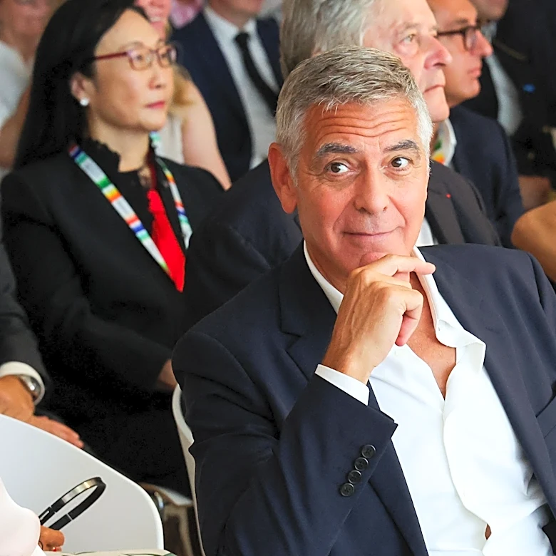 George Clooney recalls holding his 'hero' sister's hand as she died