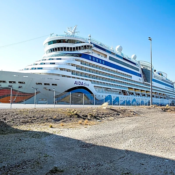 Cruise ship damaged after colliding with pier amid strong winds