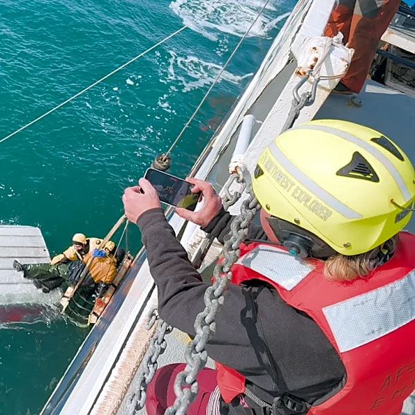 Missing teen found adrift at sea on overturned boat