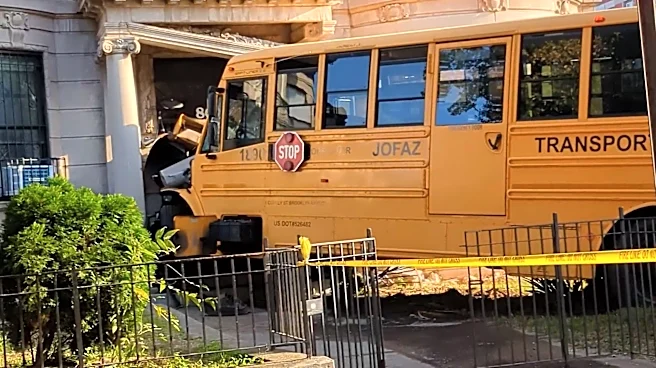 Video: School bus slams into New York City residential building
