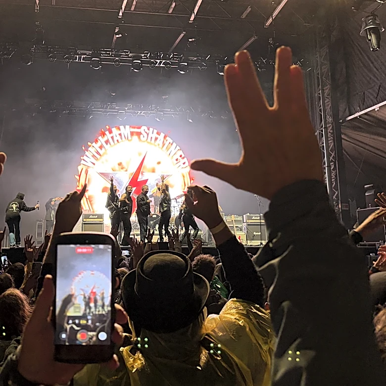 William Shatner covers 'Crazy Train' at mud-soaked Riot Fest