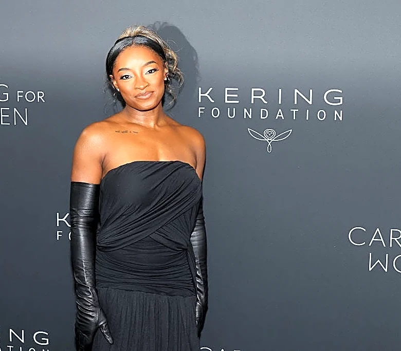 Simone Biles says masked men broke into her home, stole Porsche