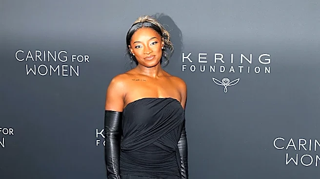 Simone Biles says masked men broke into her home, stole Porsche