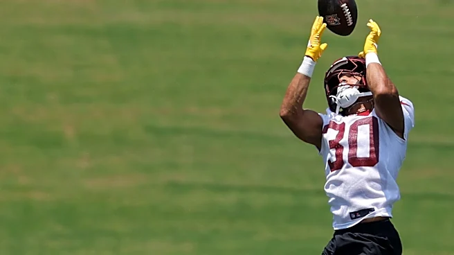 Austin Ekeler working out for Panthers