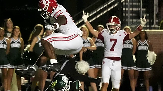 Tennessee commit David Gabriel Georges appears to levitate as he hurdles defender
