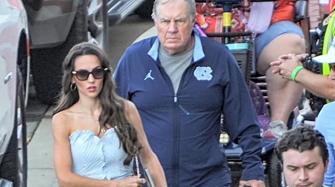 Bill Belichick, Jordon Hudson seen at Maryland high school football game