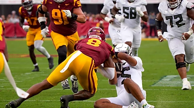 Dante Moore injury: Oregon QB takes scary hit to head, carted off field, put in ambulance