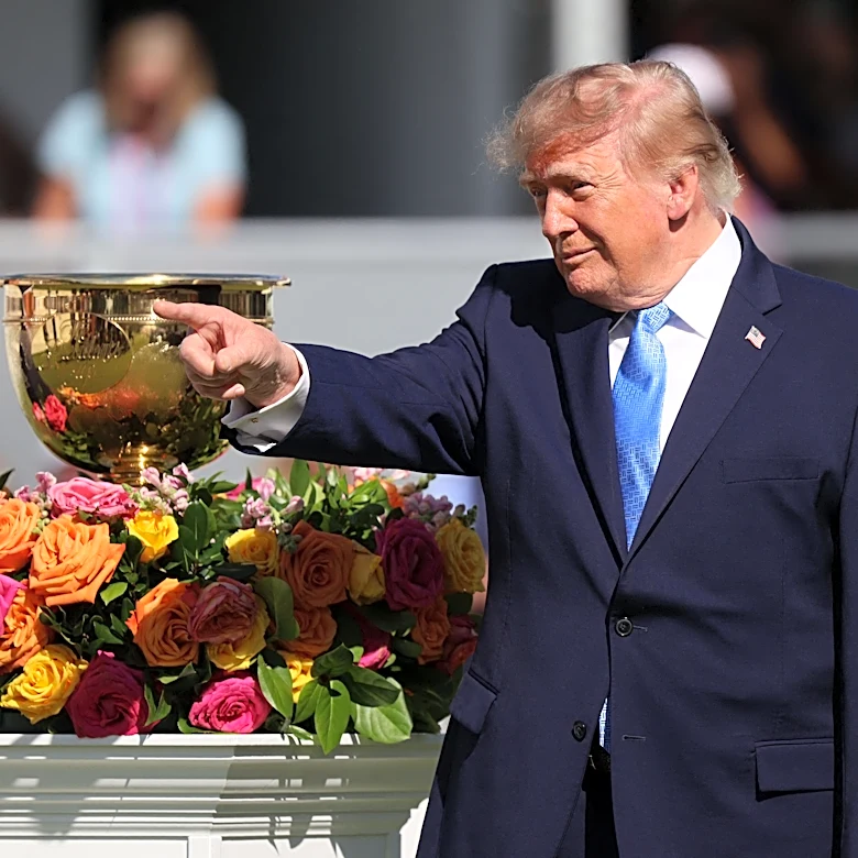 Donald Trump receives warm welcome during brief remarks at Presidents Cup