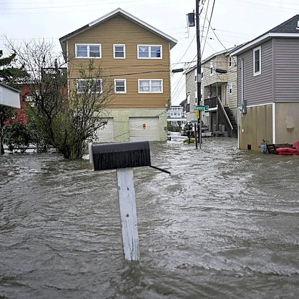 Nor'easter continues to batter East Coast with rain, wind, big surf