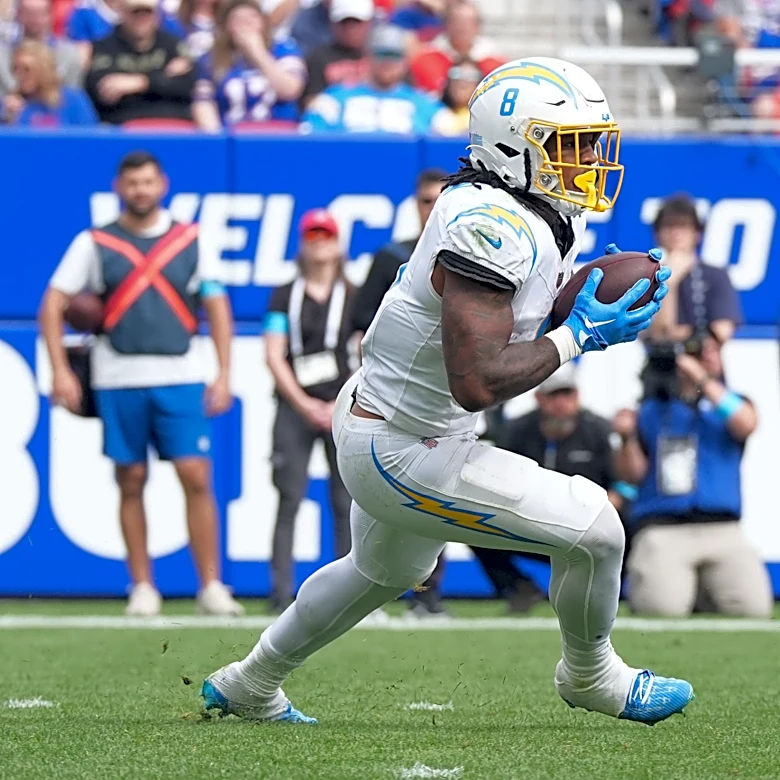 Omarion Hampton runs for 56 yards