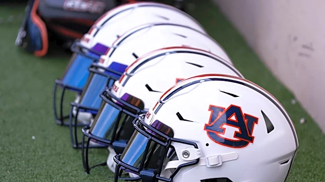 Former Auburn football staffer charged with giving confidential information to competitors