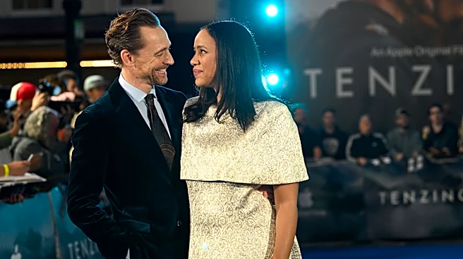 Tom Hiddleston packs on PDA with fiancée Zawe Ashton on red carpet