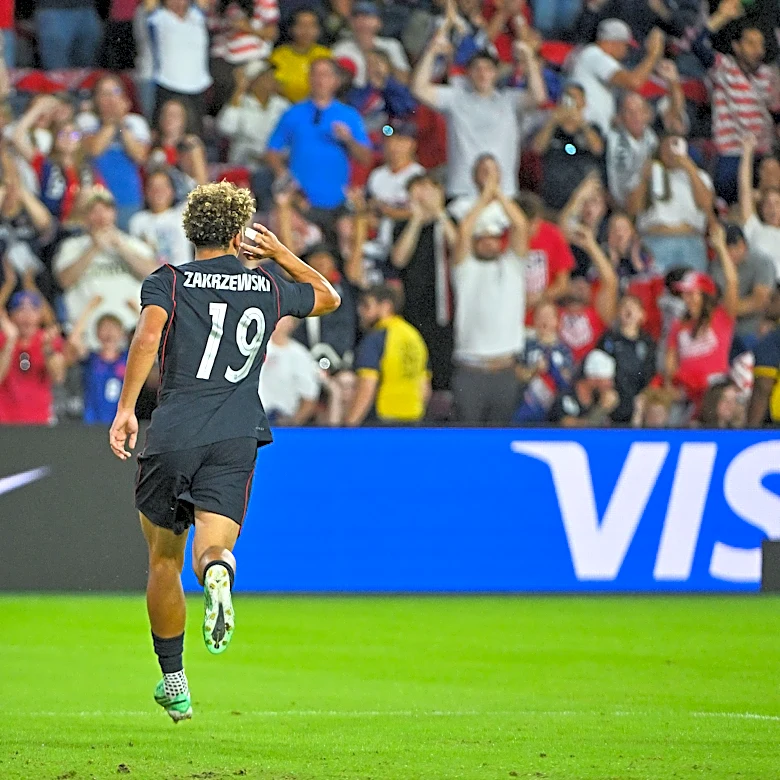 Why does USMNT forward Julian Hall wear 'Zakrzewski' on his jersey?