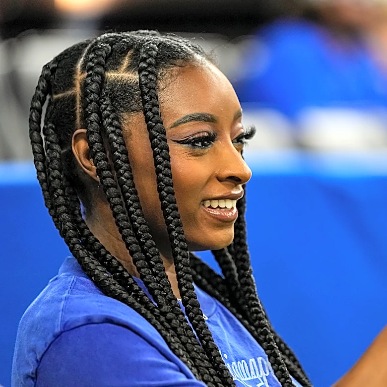 Simone Biles dons blinged out 2-piece set at Colts game in London