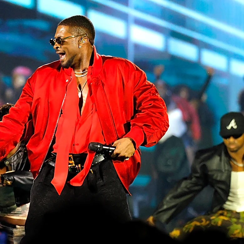 Viral videos show fan trying to grab Usher mid-performance