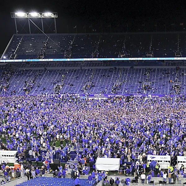 Kentucky football fans storm field after upset win over LSU. How much will Wildcats be fined?