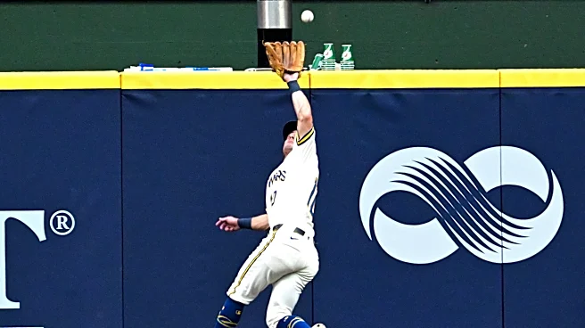 Dodgers take advantage of Brewers' defensive lapses, retake lead in wild inning