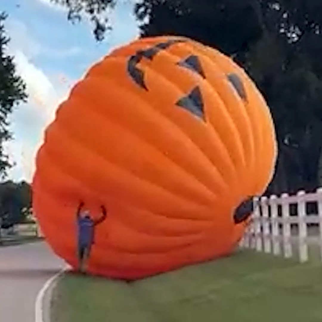 Watch giant runaway pumpkin barrel down road in North Carolina