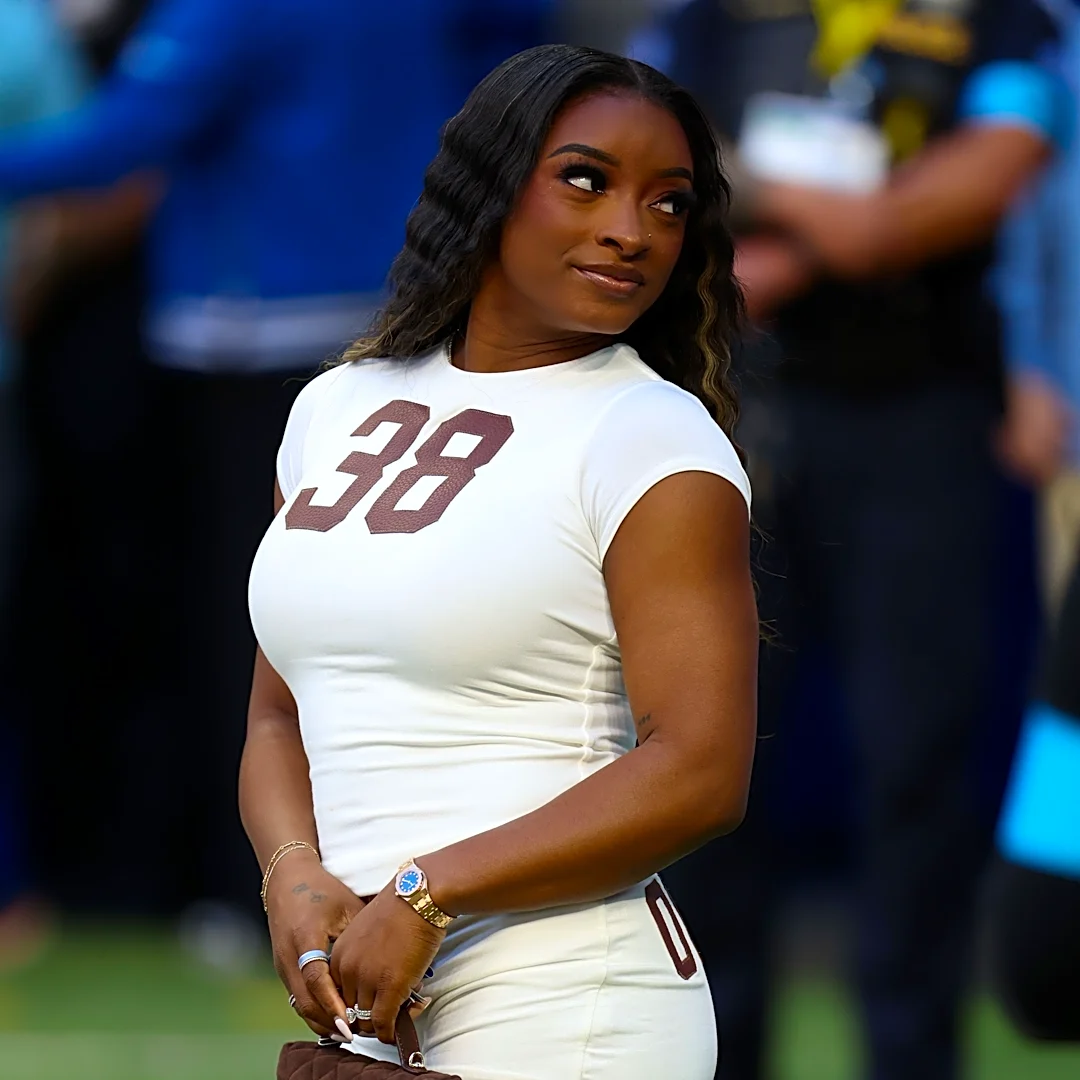 Simone Biles rocks all-white with 'football material' at Colts game