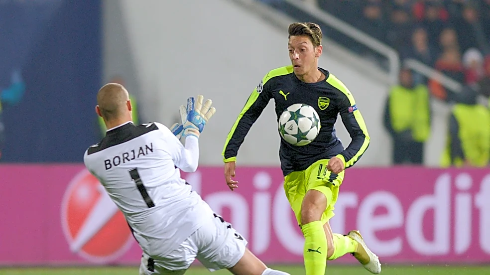 Why are Shrek and a T-Rex scoring Mesut Ozil's goal? The viral AI trend explained