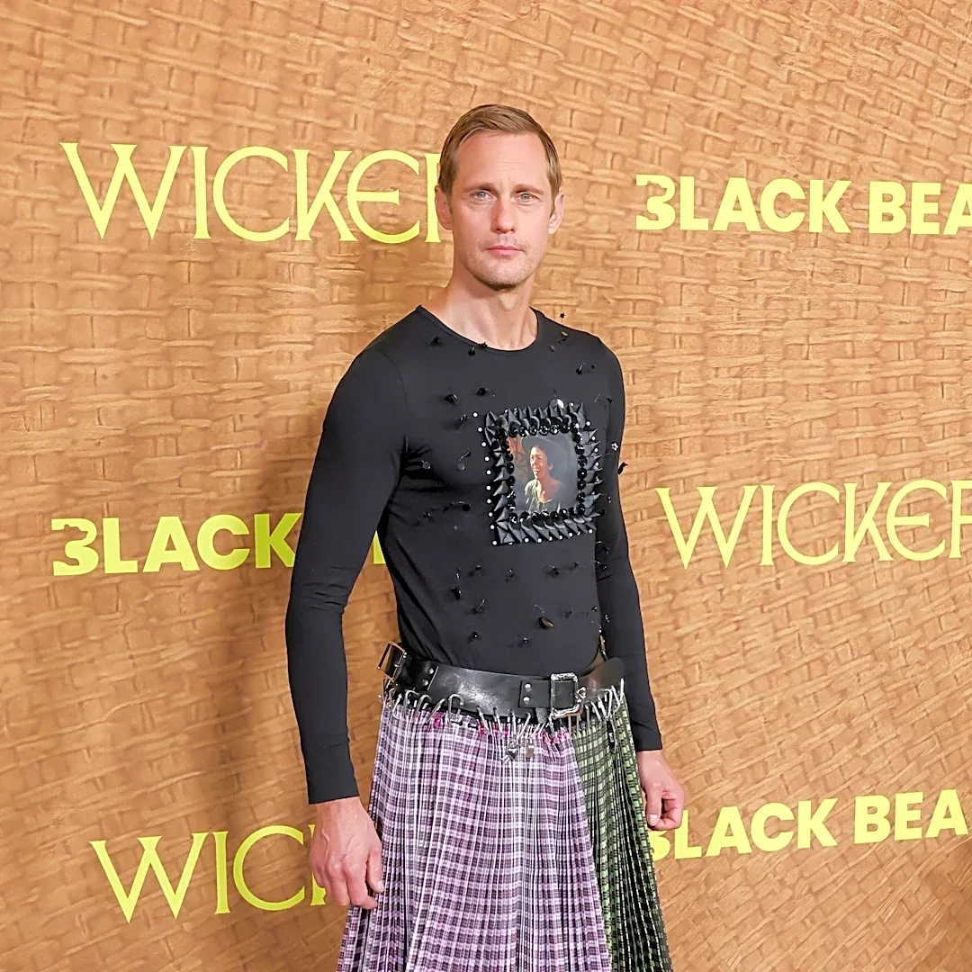 Alexander Skarsgård rocks shirt with Olivia Colman's face, plaid skirt