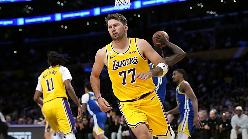 Luka Dončić makes halfcourt shot before halftime in Lakers' season opener