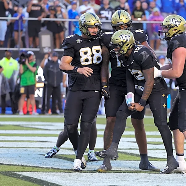 UCF storms field after double OT win vs BYU. How much will Knights be fined?