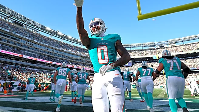 Ollie Gordon II surpasses 100-yard mark in Week 7