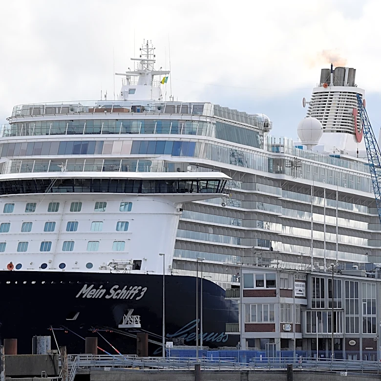 Cruise ship collides with 2 container vessels during stormy weather