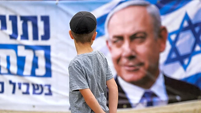 Israel's election ends in apparent deadlock, exit polls show