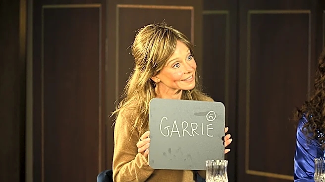 Kelly Ripa transforms into Elizabeth Holmes for 'Live' Halloween costume | Exclusive