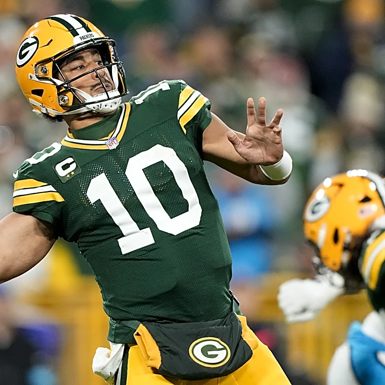 Jordan Love tosses three TD passes in win over Carolina