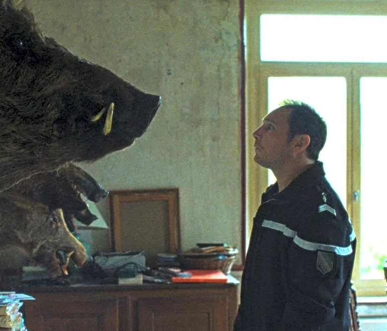 ‘Too Many Beasts’ Review: A Small-Town Policeman Gets High on the Hog in a Deliciously Droll French Crime-Caper