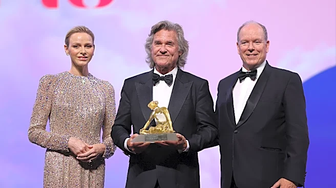 Kurt Russell Receives Crystal Nymph Award at the Monte-Carlo Television Festival From Princess Charlene of Monaco