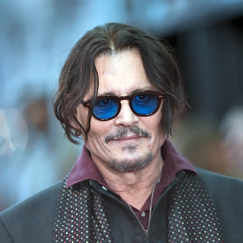 Johnny Depp Makes Surprise Comic-Con Appearance as Ebenezer Scrooge