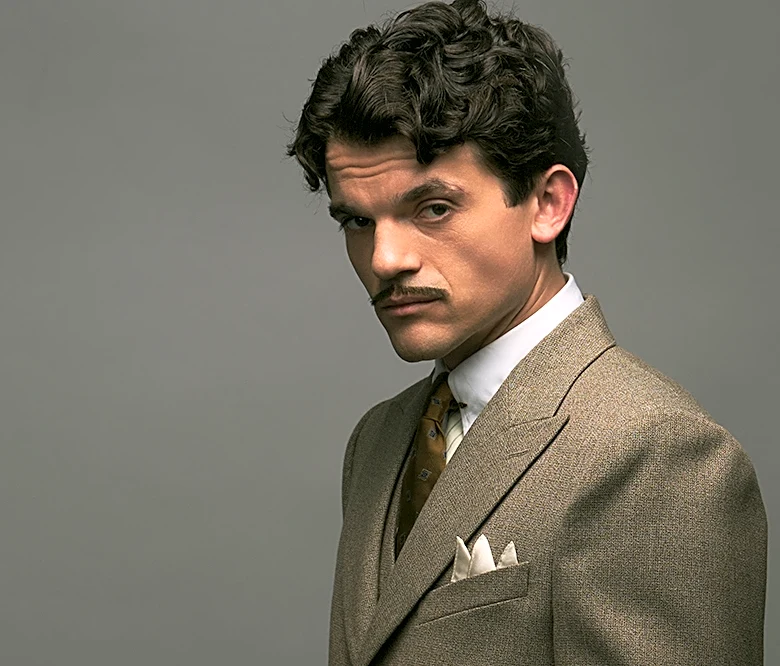 Edward Bluemel Suits Up as Detective Poirot in First Look at BBC and BritBox Series ‘Hercule’