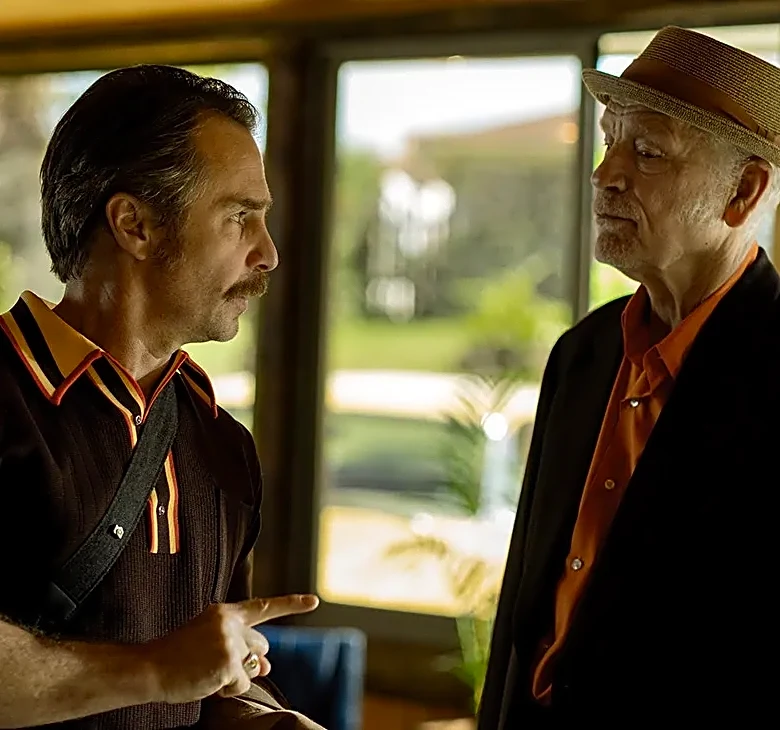 ‘Wild Horse Nine’ Review: John Malkovich and Sam Rockwell Are a Perfectly Paired Double Act in Martin McDonagh’s Melancholy ’70s Caper