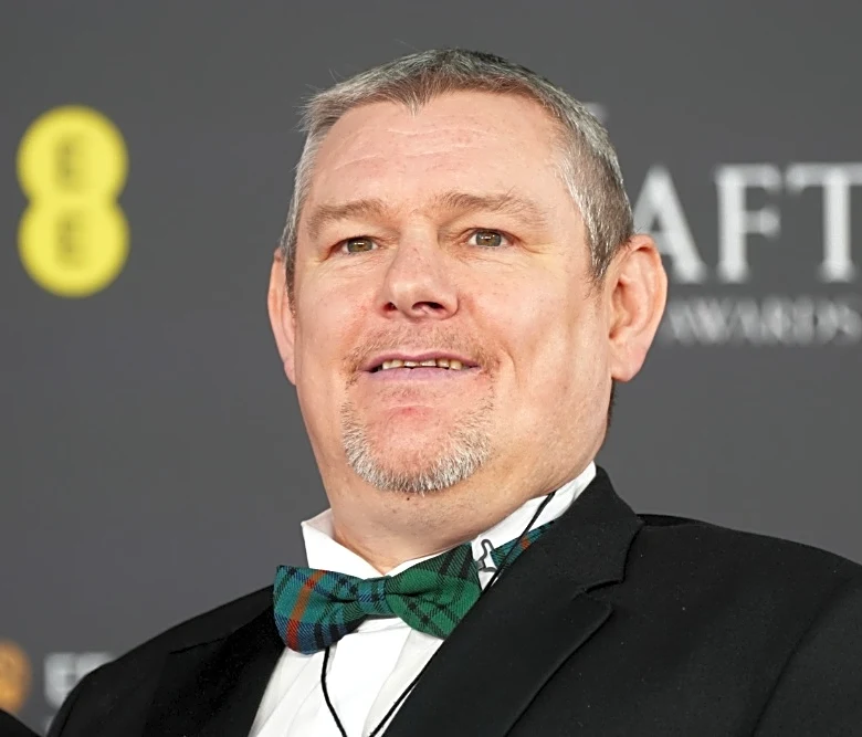 After ‘I Swear’ Scores 7 BAFTA Scotland Nods, Tourette’s Campaigner John Davidson to Watch Ceremony From ‘Separate’ Area Within Venue Following N-W...
