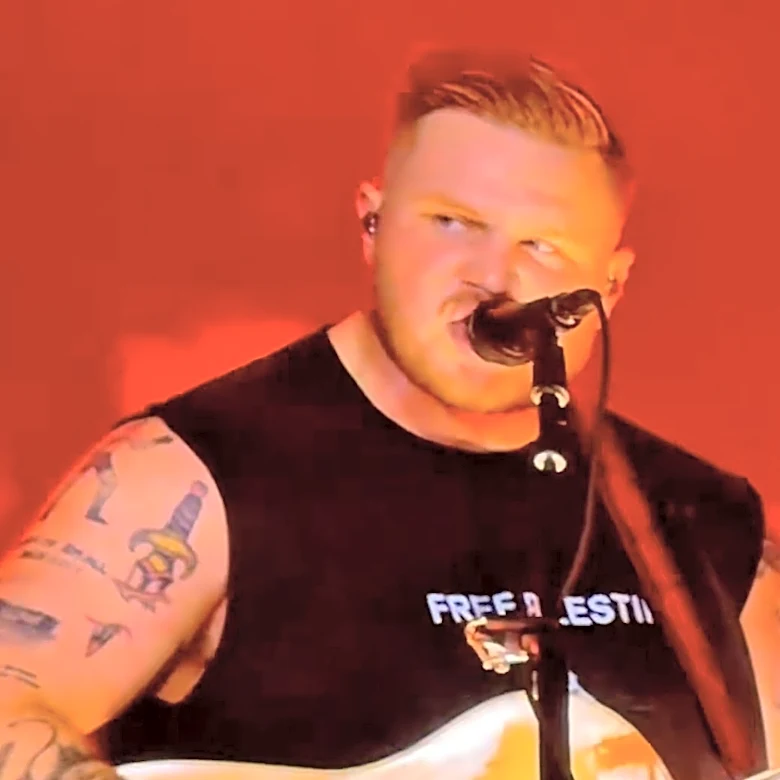 Zach Bryan Wears ‘Free Palestine’ Shirt While Headlining Robert Kraft’s Gillette Stadium; Drummer Honors Slain Palestinian Girl