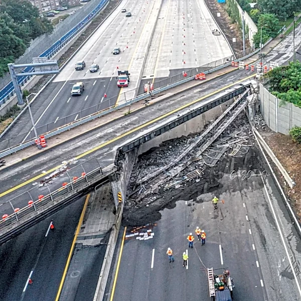 Watch: Tractor-trailer slams into NY Thruway overpass, overturns