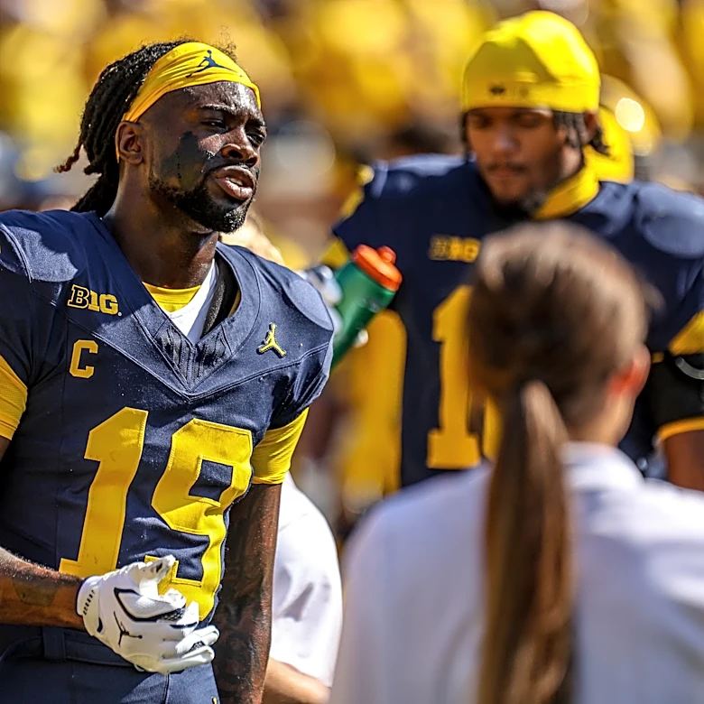 Rod Moore returns to Michigan football practice field